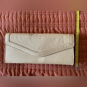 White fake snakeskin clutch